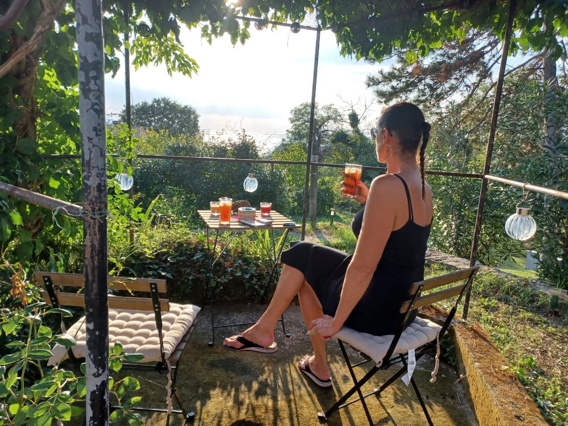 Woman enjoying juice on the terrace